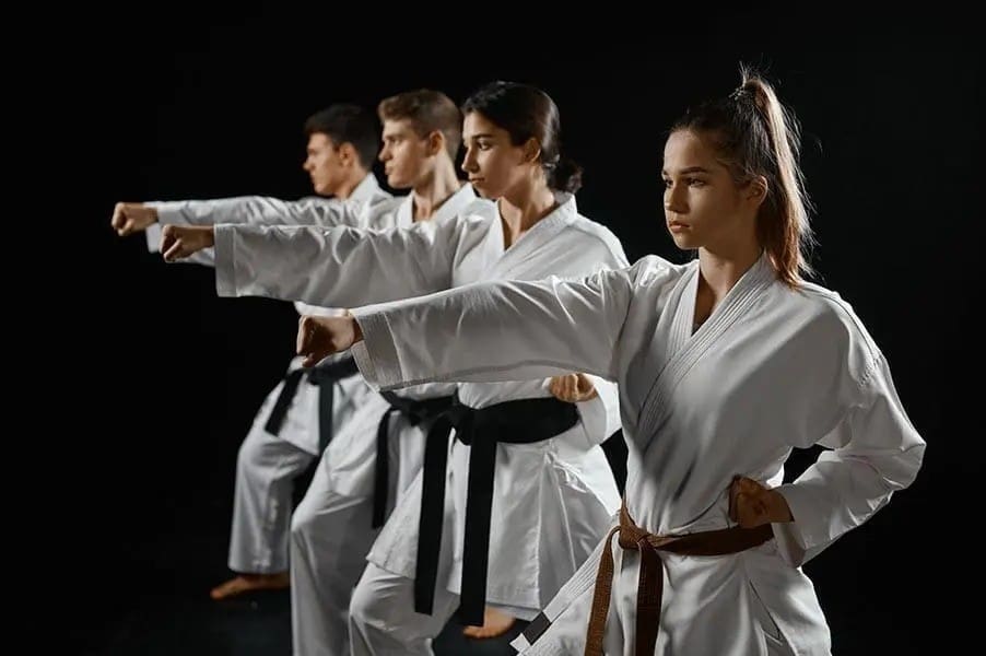 students practicing martial arts fundamentals