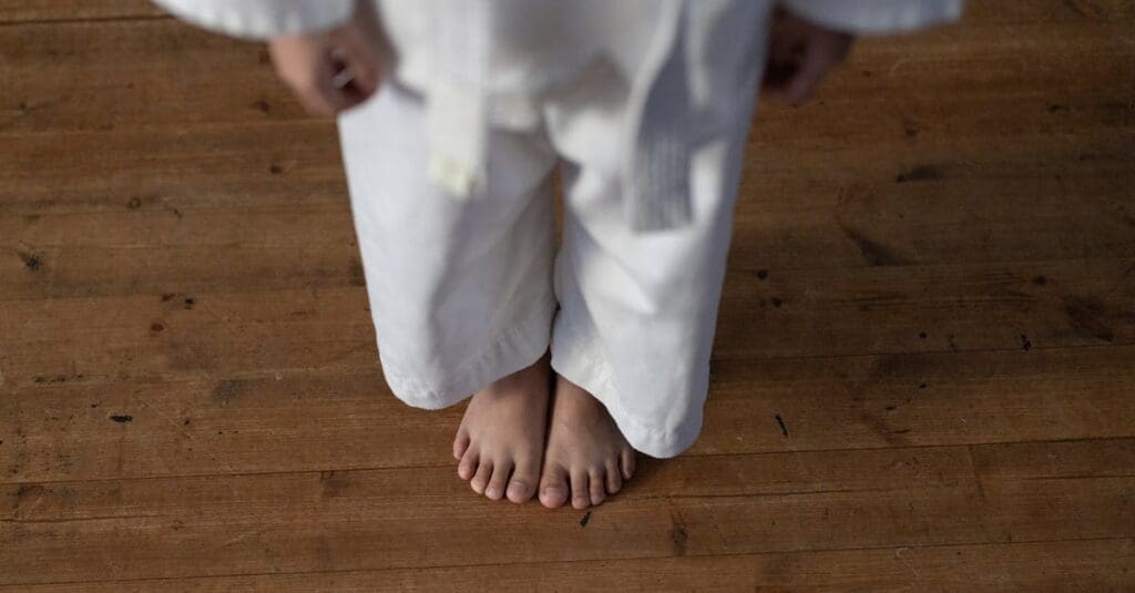 White belt student beginning kenpo karate training for beginners while developing mental discipline and focus
